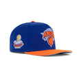New Era New York Knicks A-Frame Snapback "Majestic Blue Snow White Orange Visor" (2025-2026 Champs Embroidery)